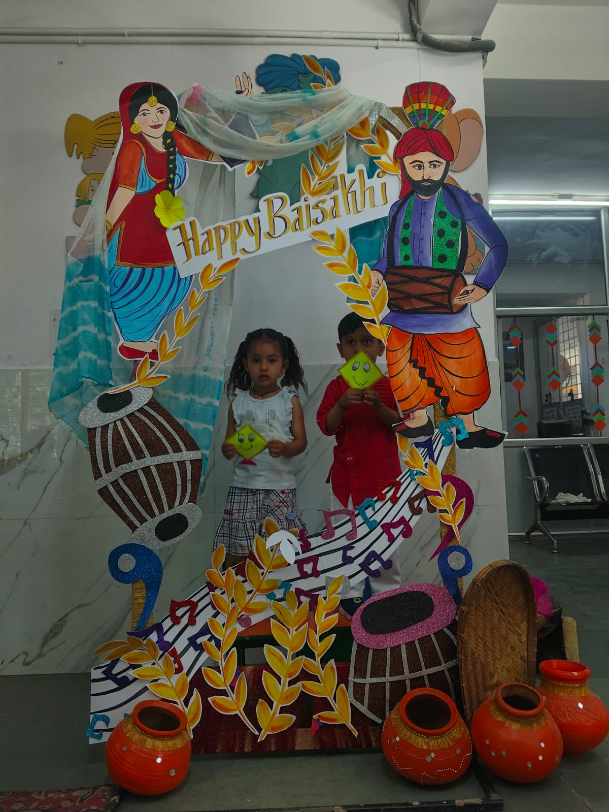 Children holding paper kites